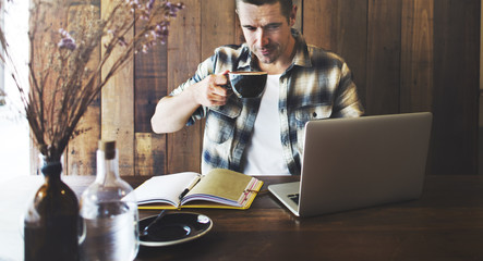 Wall Mural - man relax lifestyle working coffee shop concept