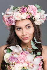 Canvas Print - Lovely woman posing with flowers