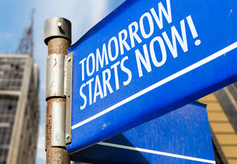 Wall Mural - Tomorrow Starts Now! written on road sign