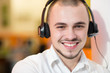 © Myvisuals - Portrait of happy smiling customer support phone operator in hea