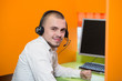 © Myvisuals - businessman with a headset portrait at bright call center helpde