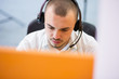 © Myvisuals - businessman with a headset portrait at bright call center helpde