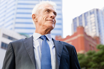 Portrait of confident businessman outdoors