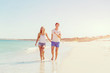 © Sergey Nivens - Romantic young couple on the beach