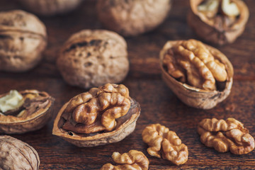 Poster - Walnuts on wooden background