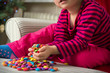 © andreaobzerova - Adorable preschool girl playing with sweets