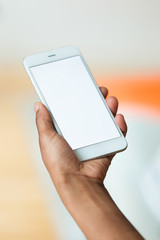 African american person holding a tactile mobile smartphone - Bl