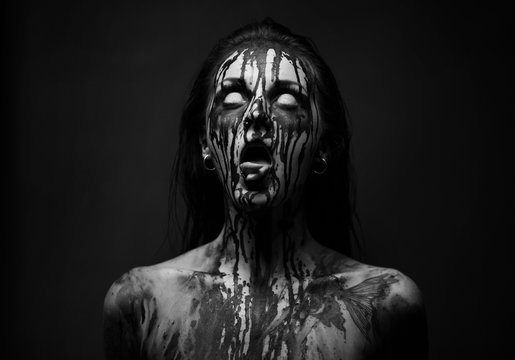 Fototapete - female demon.Art studio shot.Goth girl with sliced tongue