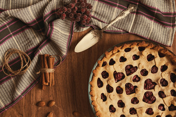 Wall Mural - Homemade cherry pie on rustic background