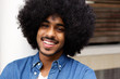 © mimagephotos - Cheerful black man with afro
