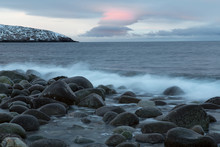 Rounded Stones On The Seashore. Barents Sea. Murmansk Region. Russia.