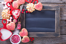 Valentines Day Cookies Around A Chalkboard