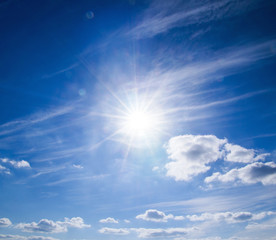 Wall Mural - white fluffy clouds in the blue sky