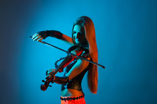 Young Female Violinist Playing Violin