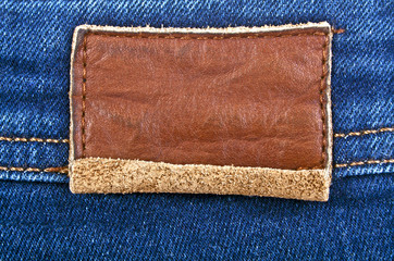 Leather jeans label sewed on jeans