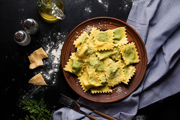 ravioli with spinach and ricotta cheese. Parmesan. in a plate