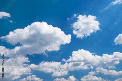 Naklejka na szybę White clouds in blue sky.