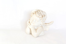 Figurine Of Angel On White Background