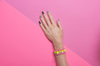 © HD92 - Vibrant Color, one hand hand, wearing jewelry.