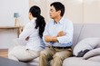 © WavebreakMediaMicro - Upset couple sitting on the couch