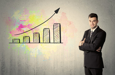 Happy businessman with colorful chart