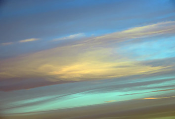Wall Mural - abstract background with bokeh defocused beautiful flame clouds in the sky
