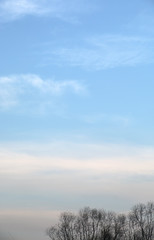 Wall Mural - abstract background with bokeh defocused beautiful flame clouds in the sky
