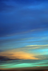 Wall Mural - colorful bokeh defocused abstract background which was created based on beautiful sunrise flame clouds in the sky