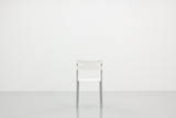 Fototapeta Paryż - White wall texture with a chair