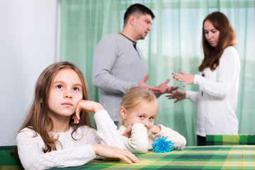 Family of four having quarrel at home