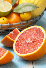 Poster - slices of grapefruit, different fresh citrus fruit