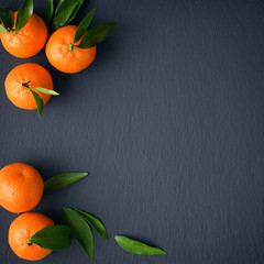 Wall Mural - Tangerines with leaves