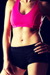 © Piotr Marcinski - Athletic young woman on the gym