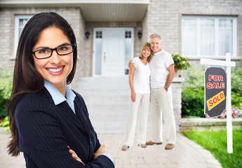 Wall Mural - Real Estate agent woman near new house.