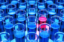 3D Rendered Blue Laboratory Test Tubes With Red Positive Results