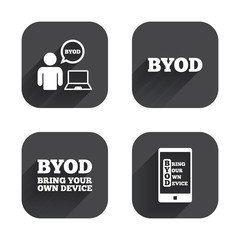 Wall Mural - BYOD signs. Human with notebook and smartphone.