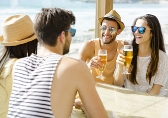 Wall Mural - Friends at the beach bar