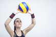 Sport Concepts and Ideas. Professional Female Volleyball Athlete with Ball