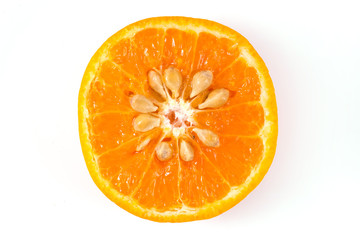 Half of a tangerine with seeds on a white background