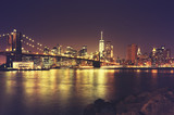 Fototapeta  - Retro toned New York waterfront at night, USA.