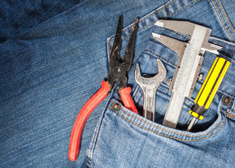 Wall Mural - tool kit in jean pocket