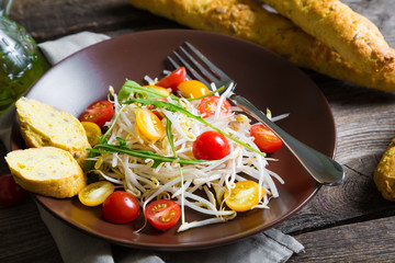 Wall Mural - Bean sprouts salad with cherry tomatoes