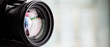 Leinwandbild Motiv Close-up of a digital camera. Large copyspace