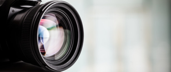 close-up of a digital camera. large copyspace