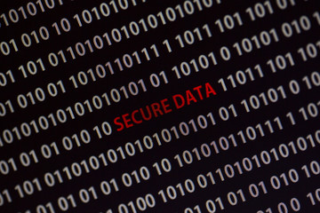 Wall Mural - 'secure data' text in the middle of the computer screen surrounded by numbers zero and one. image is