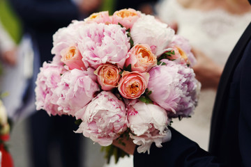 Expensive elegant wedding bouquet pink purple and orange roses c