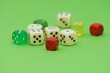 © Siegi - Colorful dice on green background