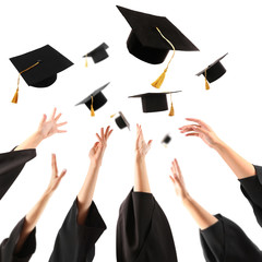 Wall Mural - Graduates hands throwing graduation hats , isolated on white