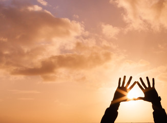 Hand shaped heart in the sky.
