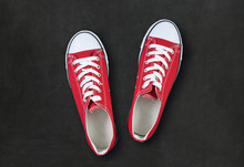 Red Shoes On Black Background With Space For Text